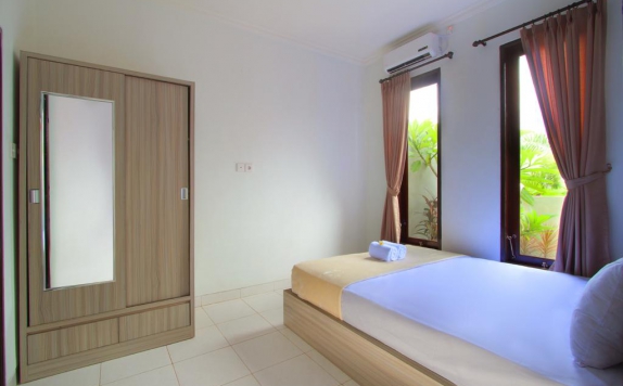 Guest Room di Alamanda Town House by Gamma Hospitality