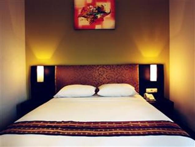 Kamar Tidur di Anugerah Express Hotel