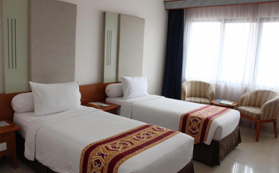 Tampilan Bedroom Hotel di Asana Kawanua Jakarta formerly Aerotel Kawanua Jakarta