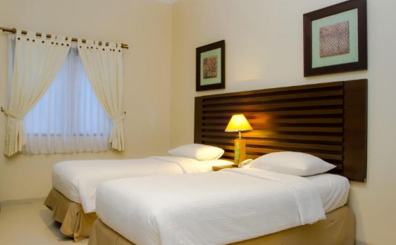 guest room twin bed di Bahamas Hotel & Resort