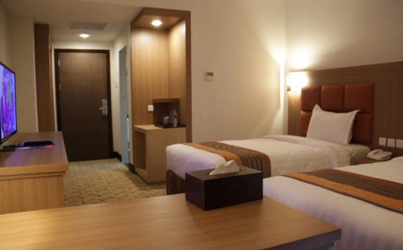 Bedroom di Cavinton Hotel
