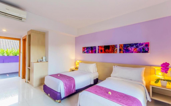 Bedroom di Conjioo Hotel Kuta