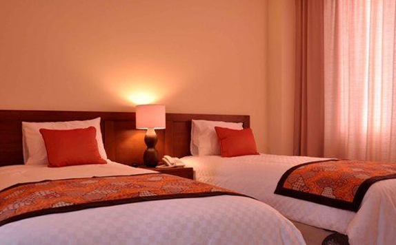 guest room di Dermaga Keluarga Hotel