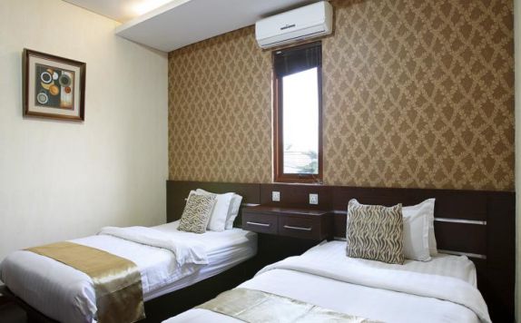 guest room twin bed di Devata Suite and Residence