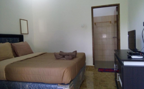 Tampilan Bedroom Hotel di Family Garden Home Stay