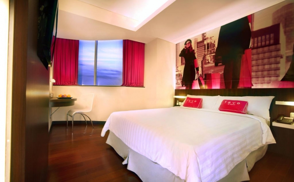 Tampilan Bedroom Hotel di Favehotel Mex Building Surabaya