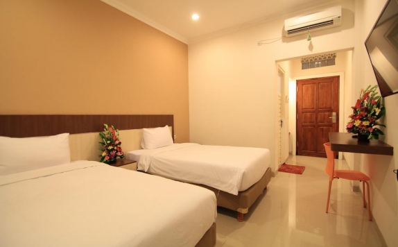 Tampilan Bedroom Hotel di Gowin Hotel Bali by Shailendra
