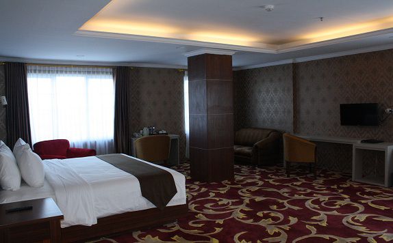 Bedroom di Grand Asrilia Hotel Convention & Restaurant