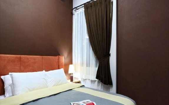 Tampilan Bedroom Hotel di Home Inn Executive Residence