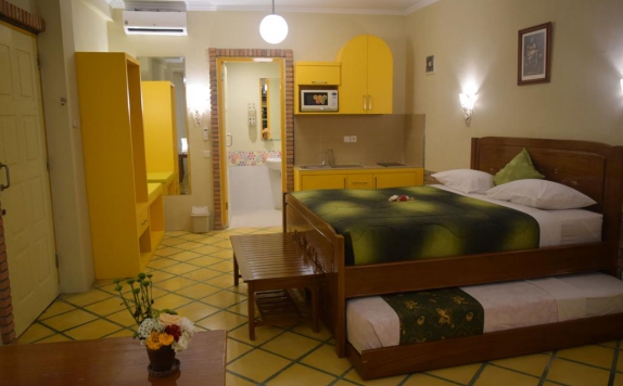 Tampilan Bedroom Hotel di Hotel Deli River