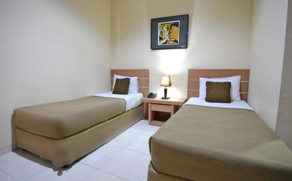 Tampilan Bedroom Hotel di Hotel Graha DPT33