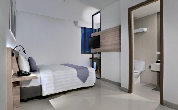 Tampilan Bedroom Hotel di Hotel Neo Gajah Mada