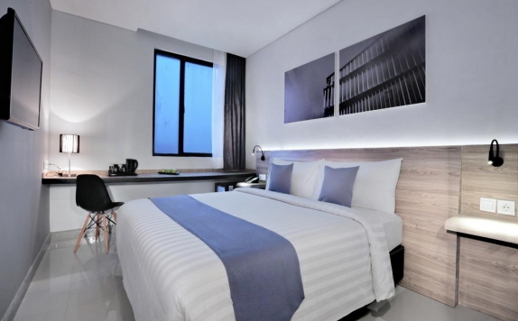 Tampilan Bedroom Hotel di Hotel Neo Gajah Mada