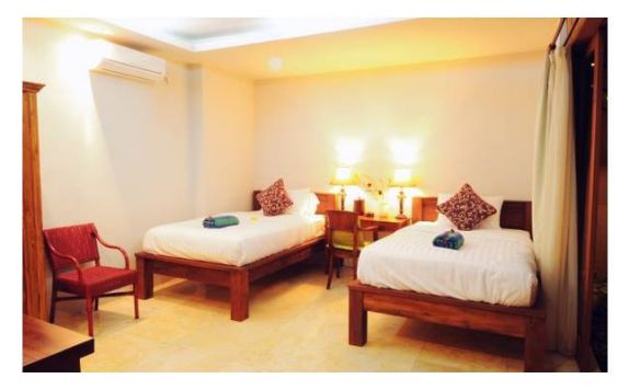 guest room twin bed di Joy Beach Villas