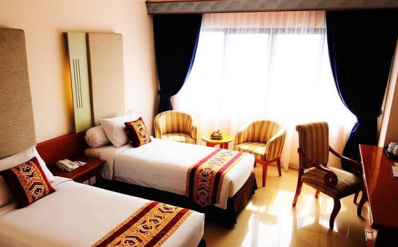 guest room twin bed di Kawanua Aerotel (Asana Kawanua)