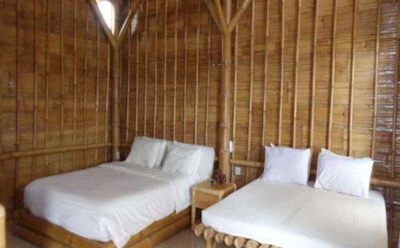 Kamar Tidur di Laksmi Ecottages ubud