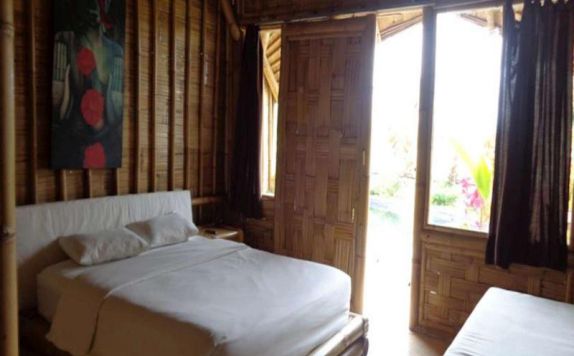 Kamar Tidur di Laksmi Ecottages ubud