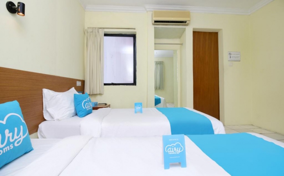 Guest room di Lautze Indah Hotel