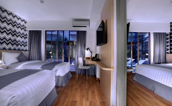 Kamar tidur di Liberta Seminyak Hotel