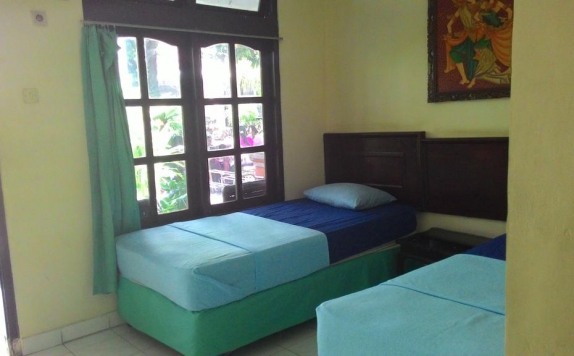 Tampilan Bedroom Hotel di Mahendra Beach Inn