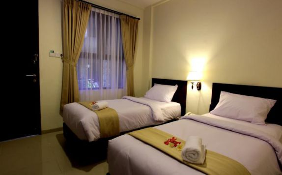 guest room twin bed di Manggar Indonesia