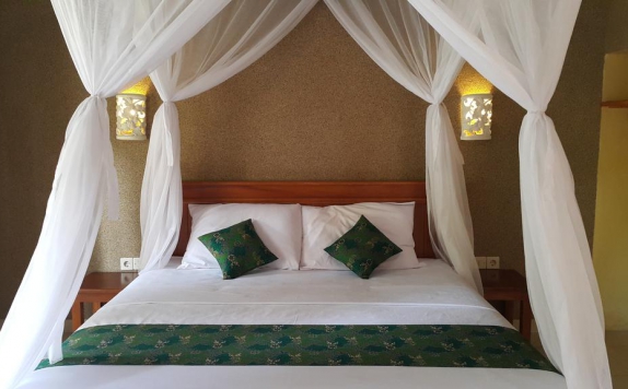 Tampilan Bedroom Hotel di Mango Tree Inn