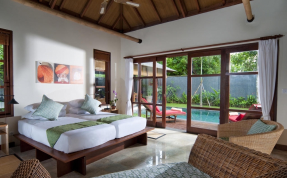 kamar tidur di Mango Tree Villas