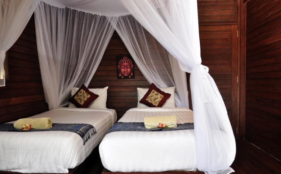 guest room twin bed di Nanuk's Bungalows