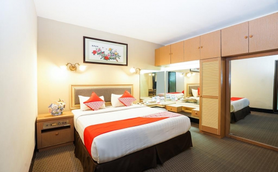 Bedroom di New Grand Park Hotel