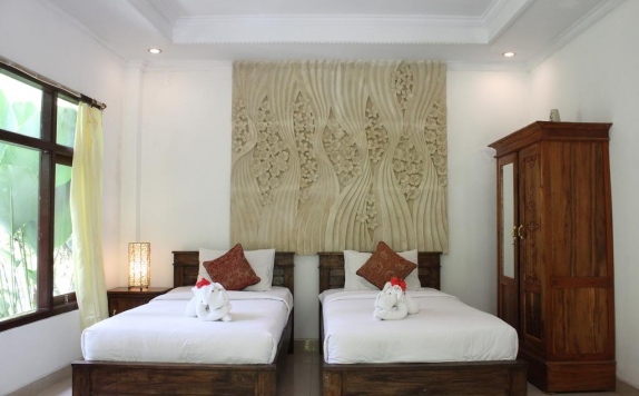 Guest room di Omah Lembu Riverview Villas