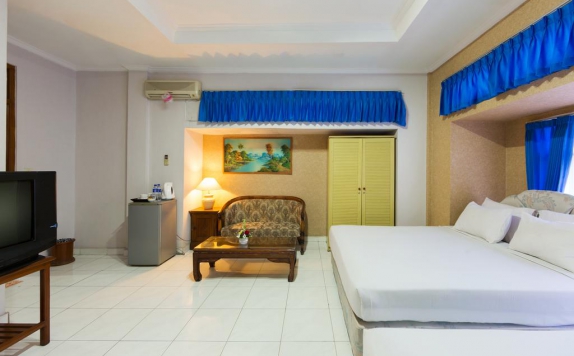 Tampilan Bedroom Hotel di OYO 3134 Puri Tamu Hotel