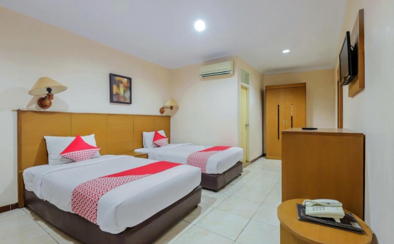 Tampilan Bedroom Hotel di OYO 919 Hotel Kalisma Syariah