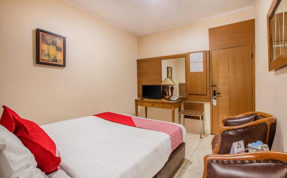 Tampilan Bedroom Hotel di OYO 919 Hotel Kalisma Syariah