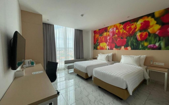 bedroom di PALM PARK Hotel Surabaya