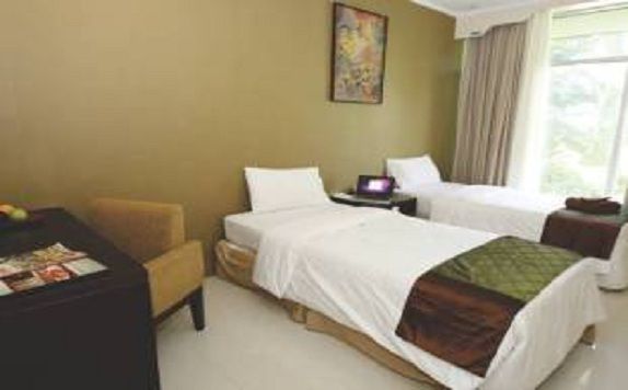 Bedroom di Palu Golden Hotel