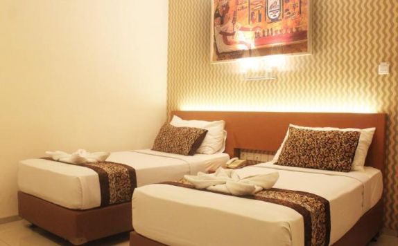 guest room twin bed di Papyrus Tropical Hotel