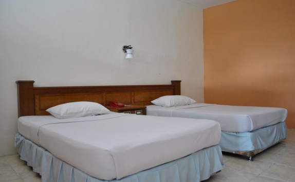 guest room twin bed di Parai Mountain Resort