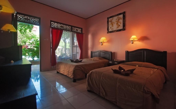 Tampilan Bedroom Hotel di Pesona Beach Inn