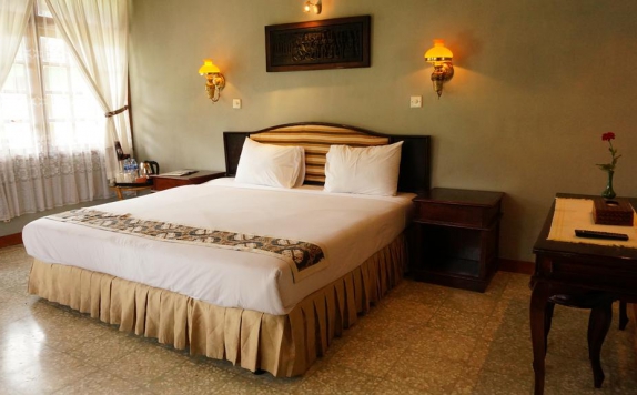 Guest room di Poeri Devata Resort Hotel