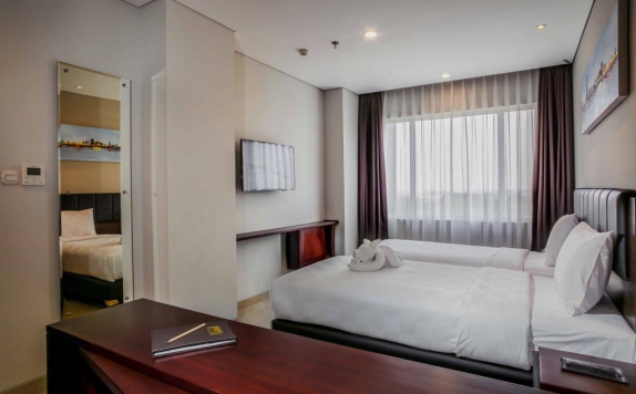 Tampilan Bedroom Hotel di PrimeBiz Hotel Surabaya
