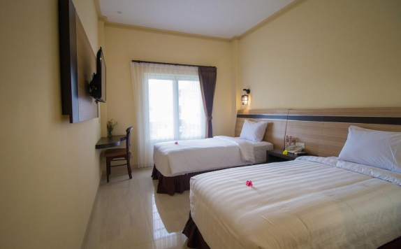 Tampilan Bedroom Hotel di Puri Indah Hotel Subak