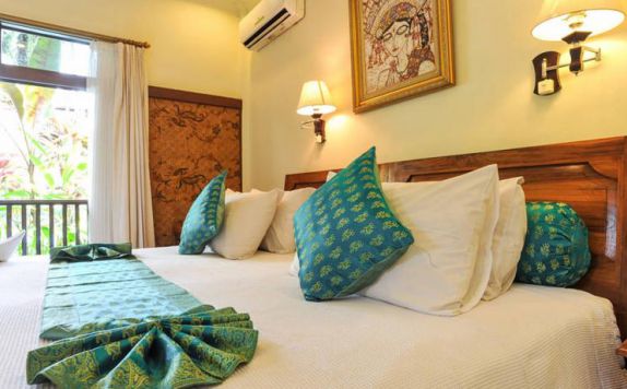 Bedroom di Puri Saraswati Bungalow Ubud
