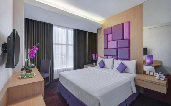 Bedroom di Quest Hotel Darmo - Surabaya by ASTON