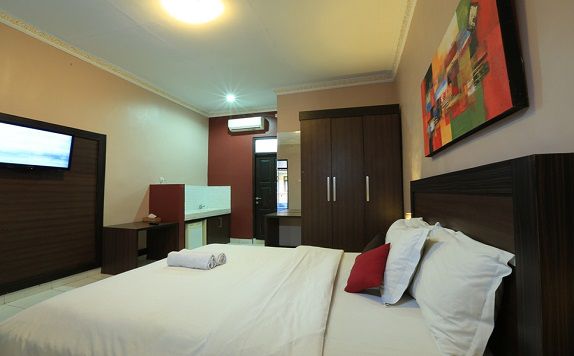 single bed di RedDoorz @ Dewi Sri