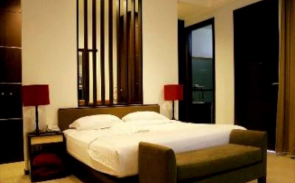 Bedroom di RUMAH NENEK Hotel