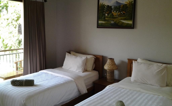 Tampilan Bedroom Hotel di Senggigi Cottages Lombok