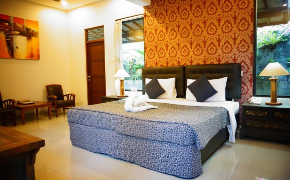 Bedroom di Taman Harum Cottages Hotel
