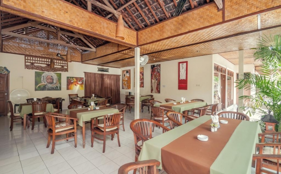Tampilan Restoran Hotel di Temple Cafe and Seaside Cottages