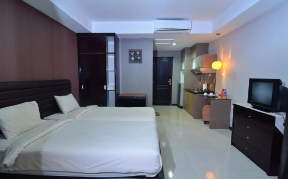 guest room twin bed di The Aroma's of Bali & Residence