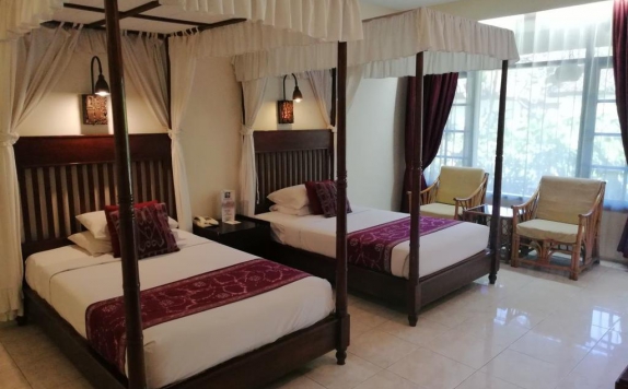 guest room twin bed di The Cakra Hotel